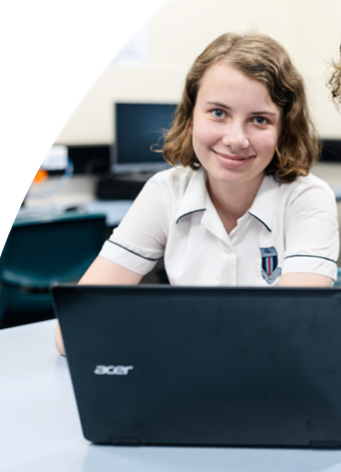 Senior student sitting at a laptop