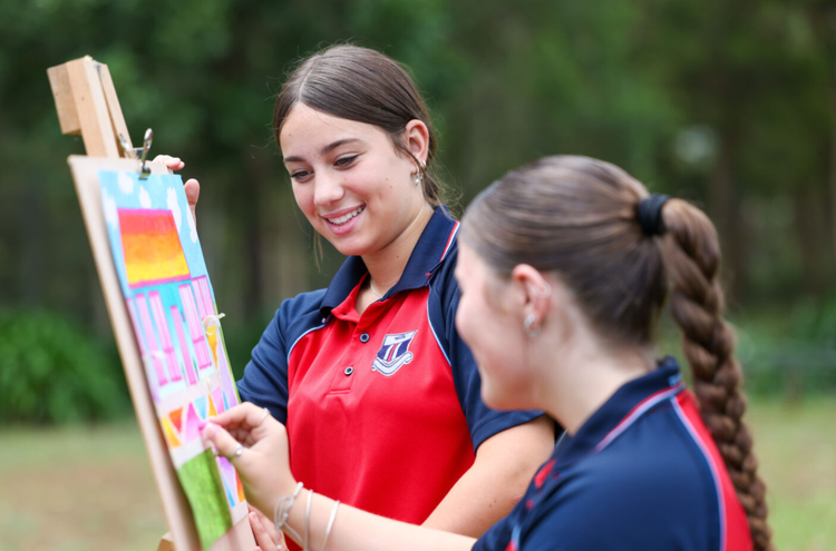 two girls painting