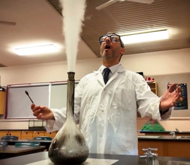 Teacher conducting an experiment